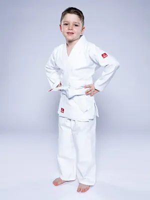 A child wearing a white Fuji Essential judo gi